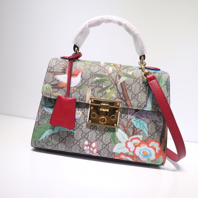G*u*i top handle bags